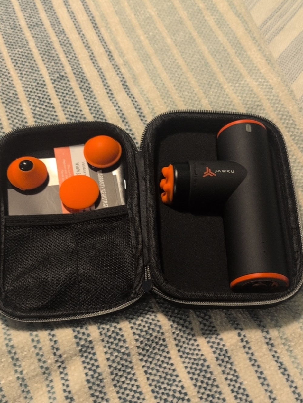 JAWKU Mini Massage Muscle Blaster in Black with Orange Accents